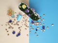 Sea Stones shells Flowers wreath, garland, crown, chaplet, coronet, circlet of flowers ring blue beach background abstract greeti