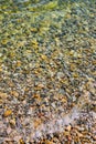 Sea stones in the sea water. Pebbles under water. The view from the top. Nautical background. Clean sea water. Transparent sea. Royalty Free Stock Photo