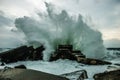 Sea storm. Beat the waves. Huge spray. Power of nature. Hurricane. Destructive power. Sea foam Royalty Free Stock Photo