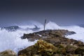 Sea storm waves dramatically crashing and splashing against rocks