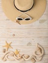 Sea style. Women`s accessories - sunglasses and hat on a wooden Royalty Free Stock Photo