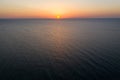 Sea sunrise early morning. Aerial View. Black Sea Sunset. Orange sky and low tide. Sea waves in the rays of a sunset. Sunset on th Royalty Free Stock Photo