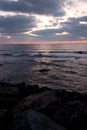 Sea before sunrise on a rocky beach Royalty Free Stock Photo