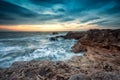 Sea sunrise at the rocky sea coast Royalty Free Stock Photo