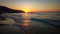 Sea sunset on the beach, Golden Embrace: A Sunset\'s Warmth