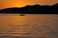 Sea sunset with boat silhouette Royalty Free Stock Photo