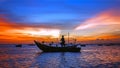 Sea sunset with boat silhouette, man Royalty Free Stock Photo