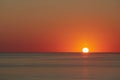 Sea sunset. Golden hour. Nature landscape and evening colours. Crystal ocean water. Panoramic horizon view, copy space