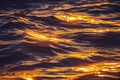 Sea sunset and ocean ripples waves as water texture background Royalty Free Stock Photo