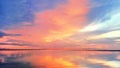 Sea sunset, ocean sunrise, tropical island beach landscape, red pink clouds, blue sky, sun glow reflection on water Royalty Free Stock Photo