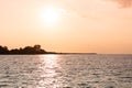 Sea sunset over pier. Beautiful seascape. Dreams of travel and freedom. Buoys at sea. Sundown sky and claim weather Royalty Free Stock Photo