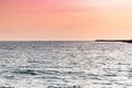 Sea sunset over pier. Beautiful seascape. Dreams of travel and freedom. Buoys at sea. Sundown sky and claim weather Royalty Free Stock Photo