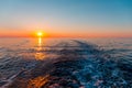 Sea sunset with ship trace Royalty Free Stock Photo