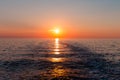 Sea sunset with ship trace Royalty Free Stock Photo