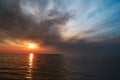 Sea sunset. Smoke wildfires sweeping across the sky Royalty Free Stock Photo