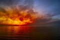 Sea sunset. Smoke wildfires sweeping across the sky