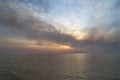 Sea sunset. Smoke wildfires sweeping across the sky