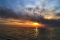 Sea sunset. Smoke wildfires sweeping across the sky