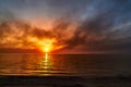Sea sunset. Smoke wildfires sweeping across the sky