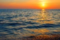 Sea sunset. The sun sets behind the horizon. Royalty Free Stock Photo