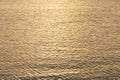 Sea surface. Calm down on the water. Texture a small ripple. Calm sea at sunset twilight