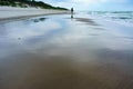 Stormy sea, sea surface on the sand, walk along the sea coast Royalty Free Stock Photo