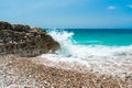 Sea swash. Waves breaking on the rocks.