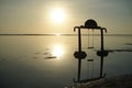 Sea swing silhouette at sunset time Royalty Free Stock Photo