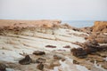 Sunrise by the sea on the beach beautiful rocks on the coast