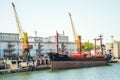 Sea Trade Port. Container terminal. Cranes, cargo ships. Horizon