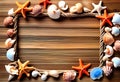 Sea travel frame decor with seashells and rope over wooden background Royalty Free Stock Photo