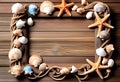 Sea travel frame decor with seashells and rope over wooden background Royalty Free Stock Photo