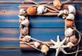 Sea travel frame decor with seashells and rope over wooden background Royalty Free Stock Photo