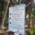 Sea turtle warning sign at the beach in florida Royalty Free Stock Photo