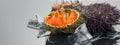 Sea Urchin with caviar close-up, on gray background. Fresh open sea urchins