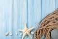 Sea vacation background with star fish and marine rope Royalty Free Stock Photo