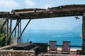 Sea view from the apartment. Terrace with ocean view. Two folding chairs. Capri island on the horizon. Italy, Sorrento. Vacation Royalty Free Stock Photo