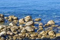 The sea view. Calm sea and large stones. Transparent water of the Adriatic Sea. Montenegro