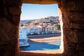 Sea view from hole in the wall. Spain, Valencia Royalty Free Stock Photo