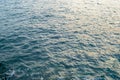 The sea view. Marine background. The evening sun is reflected in the water