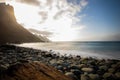 Sea view, marine panorama of the coast at sunset, sea, mountains, rocks, clouds and waves with soft light. Tenerife island coast Royalty Free Stock Photo