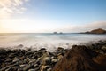 Sea view, marine panorama of the coast at sunset, sea, mountains, rocks, clouds and waves with soft light. Tenerife island coast Royalty Free Stock Photo