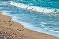 Sea view pebble beach and turquoise water tranquil scene Royalty Free Stock Photo