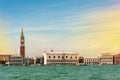 Sea view from Piazza San Marco in Venice, with the bell tower of St. Mark in the background. Venetian Lagoon with the Basilica of Royalty Free Stock Photo