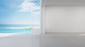 Sea view room of luxury summer beach house with glass door and wooden floor terrace near swimming pool. Royalty Free Stock Photo