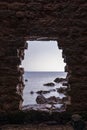 Sea view through the ruins of an ancient fortress Royalty Free Stock Photo