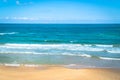 Sea view by the sandy beach against blue sky in Kilyos, cargoships at the far end, Black Sea Region in Istanbul Royalty Free Stock Photo