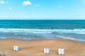 Sea view by the sandy beach against blue sky in Kilyos, cargoships at the far end, Black Sea Region in Istanbul Royalty Free Stock Photo