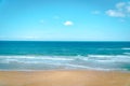 Sea view by the sandy beach against blue sky in Kilyos, ships at the far end on the sea, Black Sea Region in Istanbul