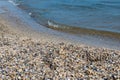 Sea view with sandy beach and shells. Concept landscape, background Royalty Free Stock Photo
